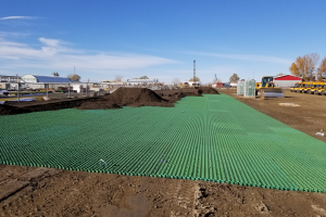 CORE Grass driveway and parking pads being installed at a Bus Facility