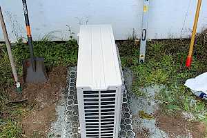 Place your heat pump on the foundation.